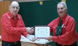 Afternoon Squares' long-time treasurer, Gene Oberly, received a certificate of appreciation from Steve Huntsman for his and his wife Elaine's many years of service to the club.