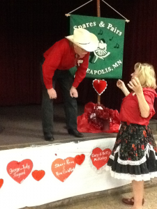 Larry Fruetel getting ready to review, talking to Kathleen Billings.