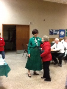 Mary Murphy, the food specialist greeting Elaine Gorshe.