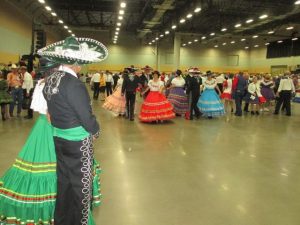 Exhibition dancers were colorful and added sparkle to the convention.