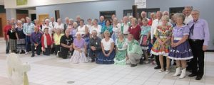 Dancers with Caller Jerry Junck.