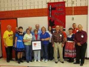 Beaux & Belles retrieved their banner.