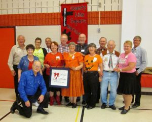 Beaux & Belles retrieved their banner.