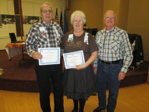 Don Lundell and Maivs Johnson received their 3rd "Traveler" award.