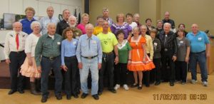Dancers with Caller Tom Allen and Cuer Sarah Klaphake.
